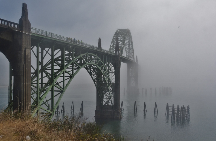 bridge disappearing into fog